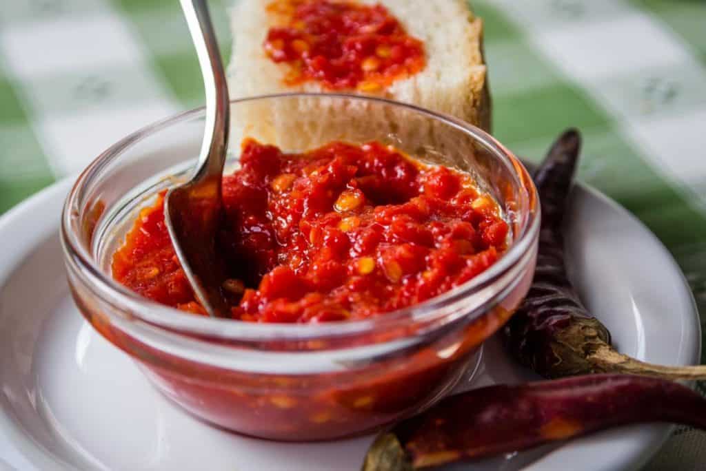 Аджика из помидор и чеснока на зиму без варки: 15 рецептов приготовления в домашних условиях